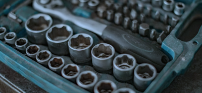 A detailed shot of a professional socket wrench set, essential for refrigeration maintenance and repair, ensuring efficient servicing and long-lasting performance.