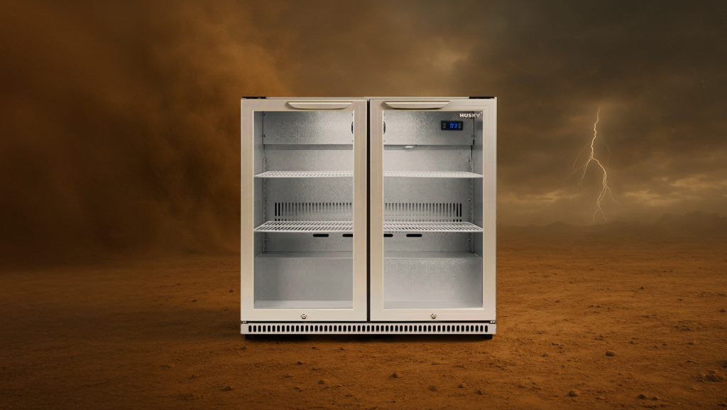 Durable Husky outdoor back bar fridge showcased in extreme weather conditions with a stormy background